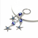 Three Star Fish Evil Eye Keychain